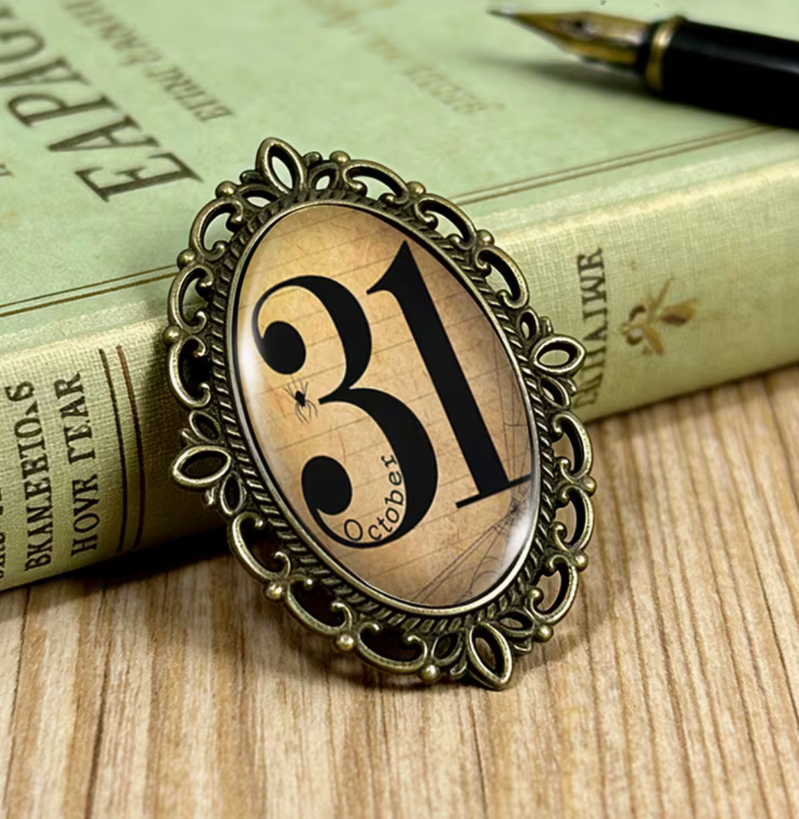 October 31 Oval Lace-Edged Glass Brooch
